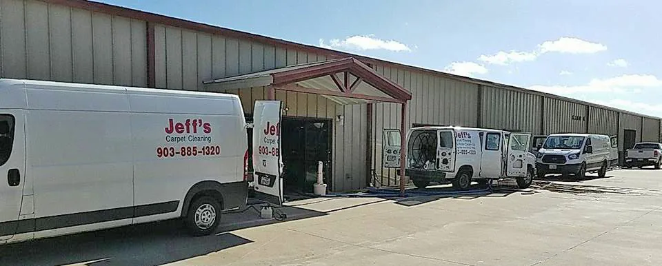 Jeff's Carpet Cleaning & Restoration fleet of service vans at the Sulphur Springs shop
